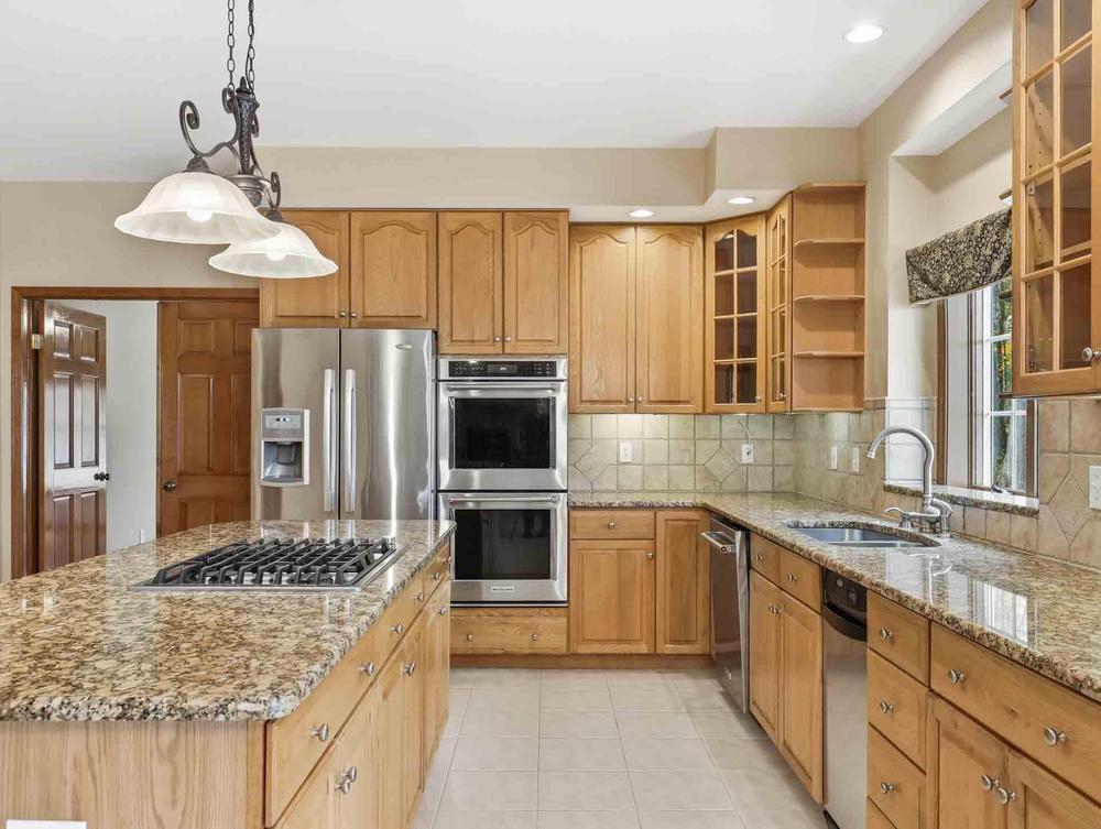 HDR interior shot: kitchen straight on. Show sellers how you capture light, color, and space